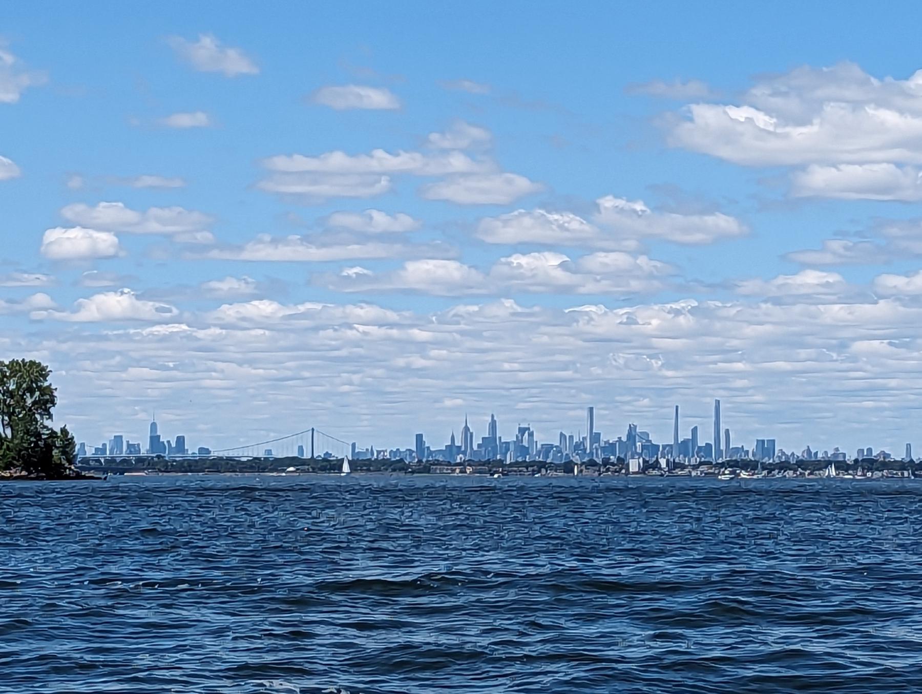 NYC skyline from Manhasset Bay. The Whitestone bridge is on left.